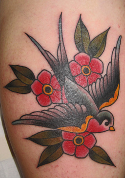 traditional swallow tattoo bold lines minimal color