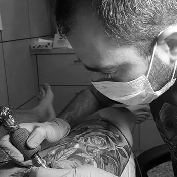 tattoo working tattooing chris cosmos
