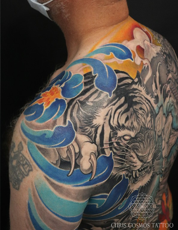 tattoo irezumi japanese backpiece neotraditional battle royal dragon tiger geisha chris cosmos limassol cyprus