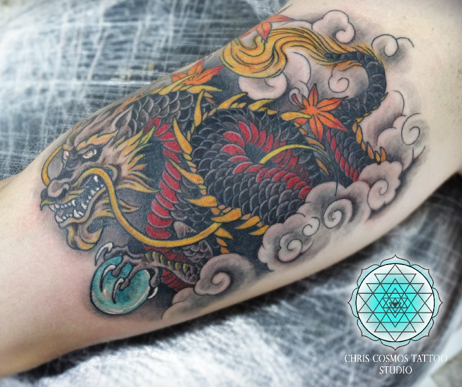 red golden dragon japanese tattoo globe color